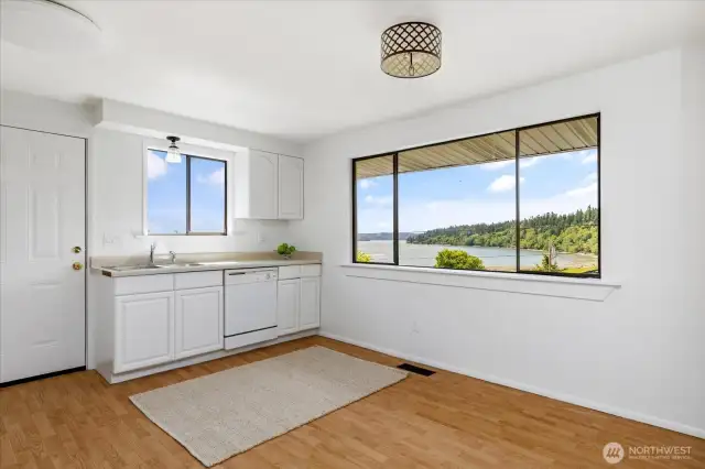 Kitchen and dining space you have a water view.
