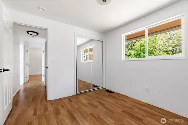 Mirrored closets and tons of natural light.