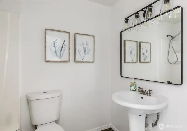 The second full bath on the lower level.