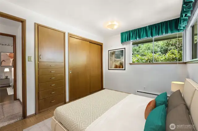 Bedroom 4 with closet and built ins. Virtually staged.