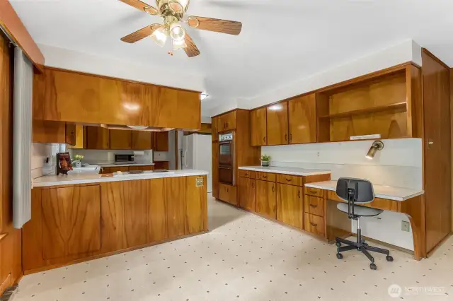 Small office area next to kitchen.