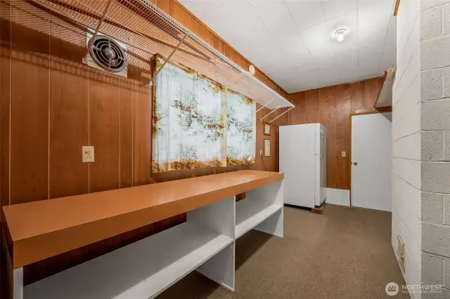 Side room off rec room with plenty of counter space and room for storage.