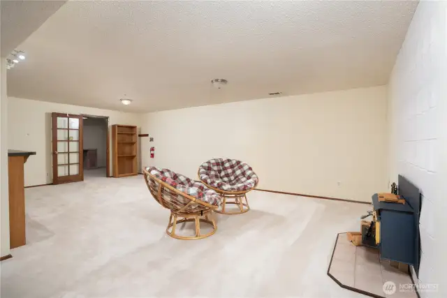 Huge downstairs rec room with fireplace