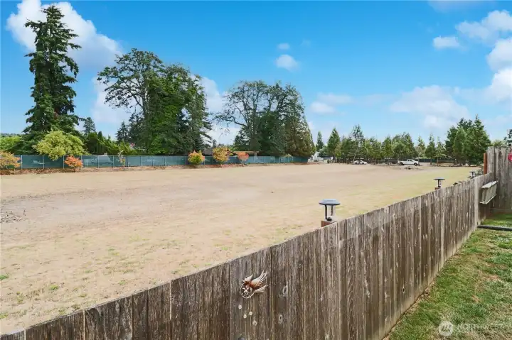 Enjoy wide open space behind the home with no neighboring house, offering added privacy and a peaceful view.