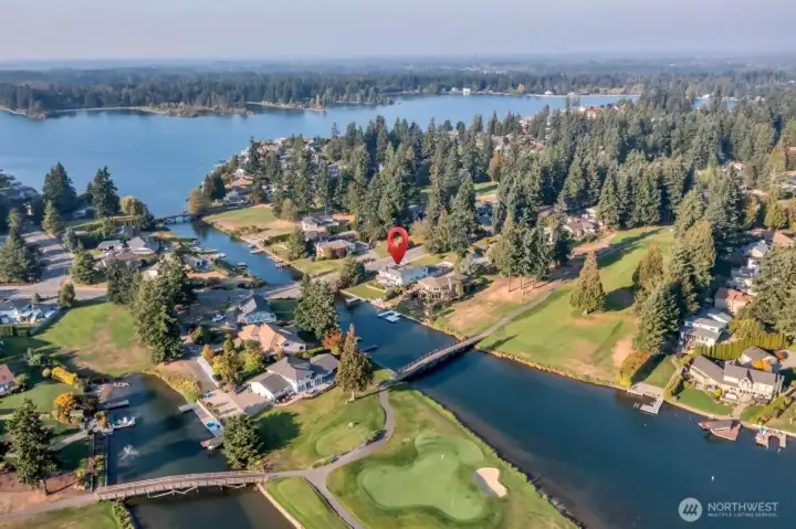 Beyond your doorstep, the community offers resort-style amenities including private roads, 24/7 security, pool, beaches, boat launch, tennis and pickleball courts, and an outer island nature trail.