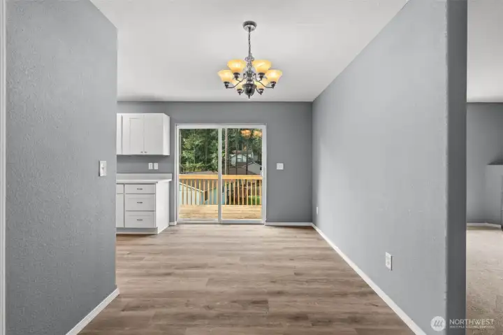 Entry hall toward eat in kitchen area