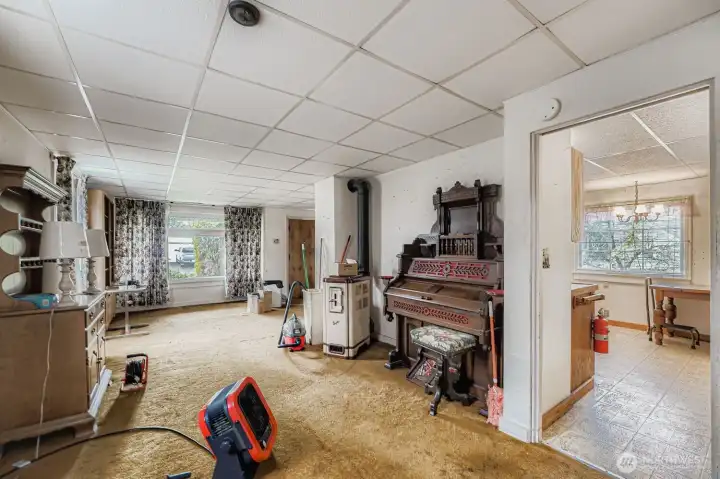 Large living room waiting for your creativity! Large windows, open floor plan