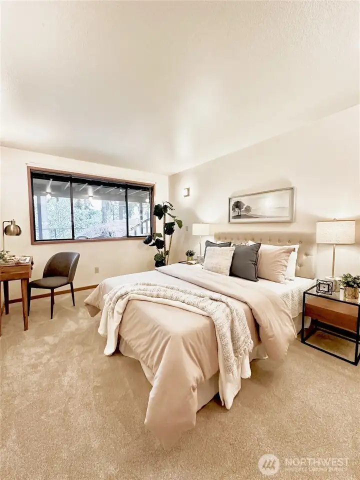 Elegant guest bedroom at lower level.