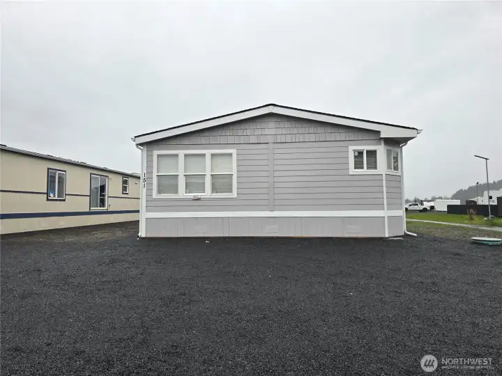 Designated parking area in front of the home.