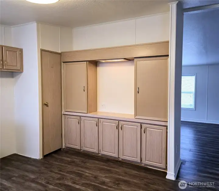 Built-in lighted hutch creates an ideal coffee bar station with extra storage for dishes, glassware, or entertaining essentials.