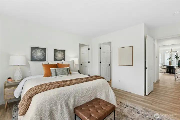 Main level bedroom with attached bathroom