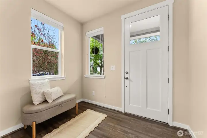 Welcoming entryway with room for a bench or sitting area for added convenience