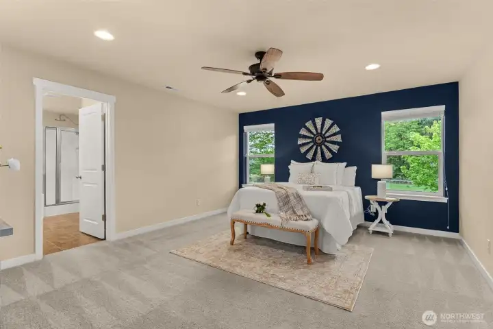 Expansive primary suite with peaceful backyard views and a 5-piece ensuite