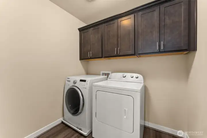Generously sized upstairs laundry room for added convenience