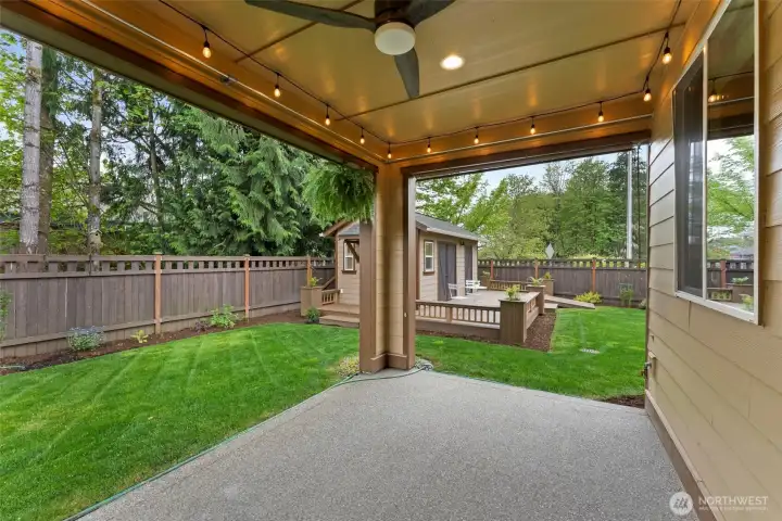 Beautiful covered back patio with shade-ready setup, backyard views, and gas stub for BBQ