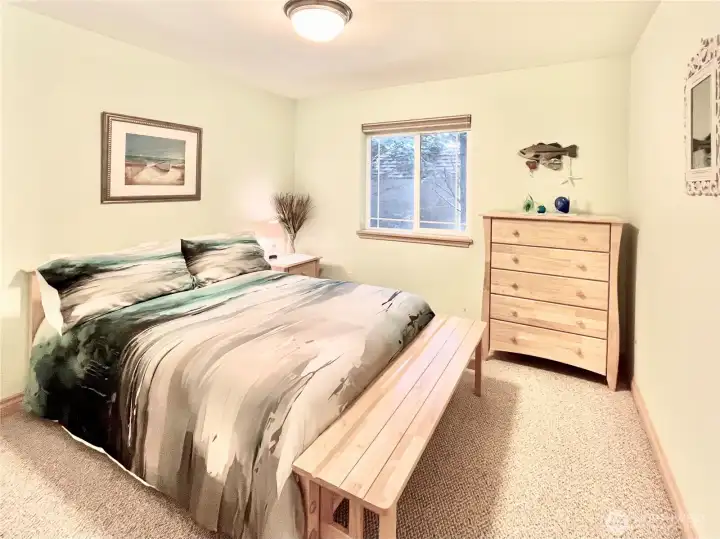 The Ocean Room, Complete with a Queen   Bedroom Set and Ample Space, Perfect for   Hosting Guests or Creating a Home Office. Its   Coastal-Inspired Design Adds a Relaxing,   Versatile Touch