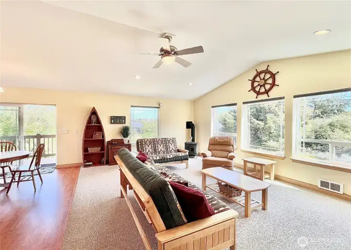 Upstairs Apartment - A charming corner propane stove adds both   warmth and character, making it an ideal   spot to relax or host guests.