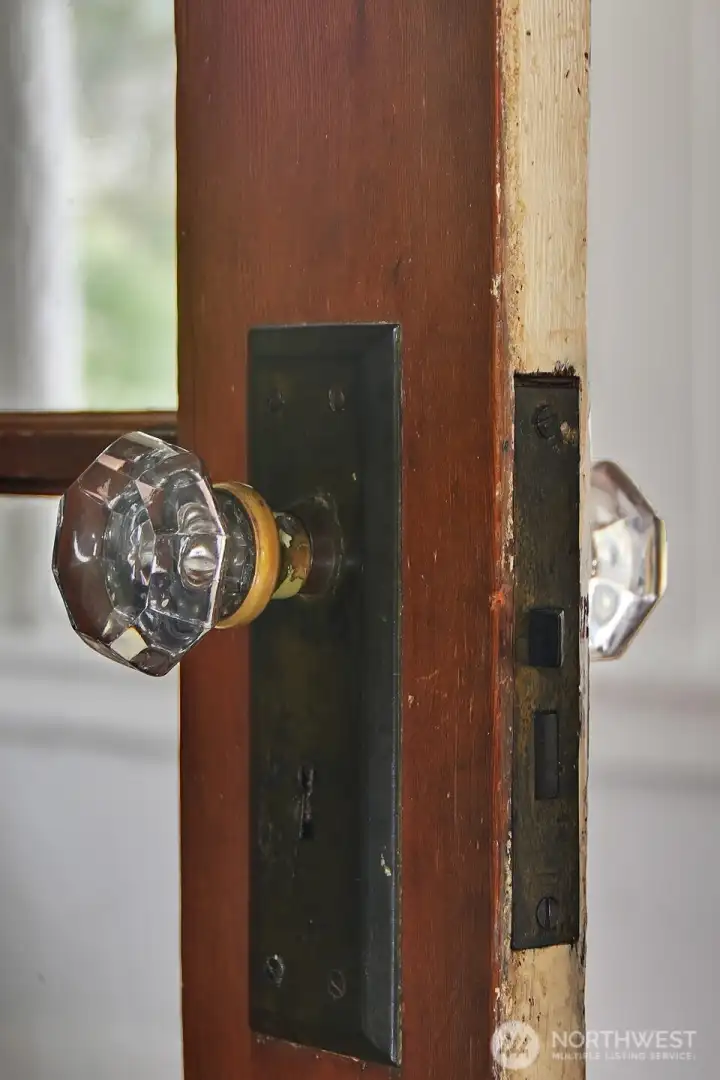 Gorgeous old glass doorknobs throughout the home.