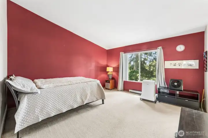 Spacious primary bedroom offering a comfortable and private retreat.