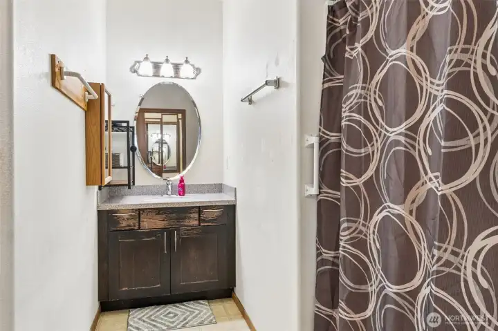 Convenient 3/4 bathroom located on the main level.