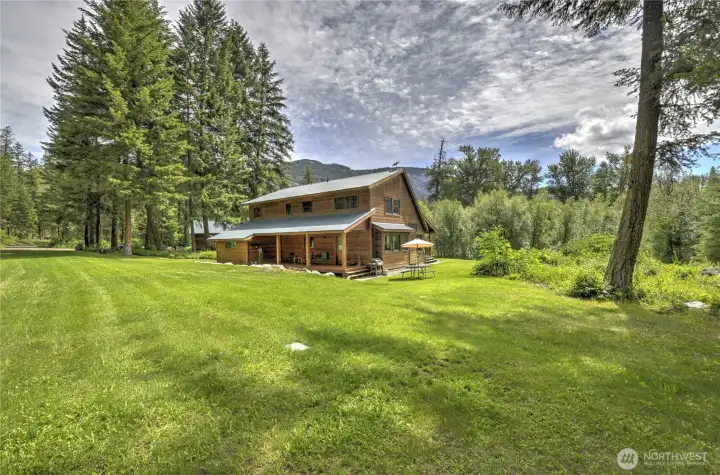 Beautiful landscaping and spectacular views surrounding dream home.
