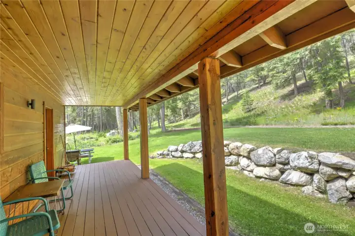 2end covered deck with seamless indoor outdoor living.