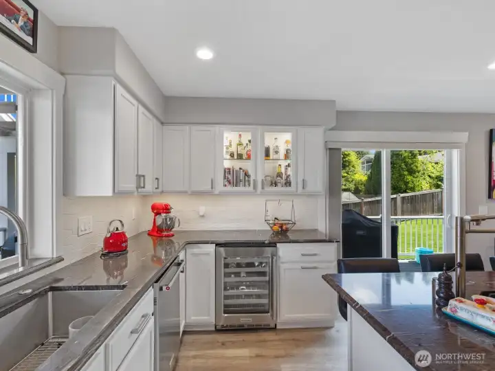 Luxurious Quartzite countertops, Wine fridge Luxurious Quartzite countertops, Wine fridge