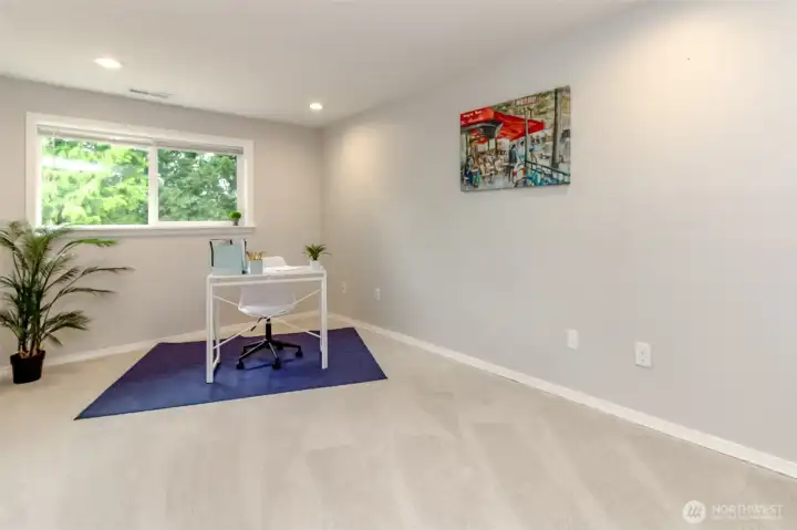This oversized 4th bedroom on the lower level is a great bonus for guests, hobbies, or a private retreat.