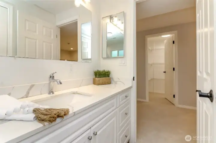 This lower-level 3/4 bathroom is a great bonus for guests and everyday living