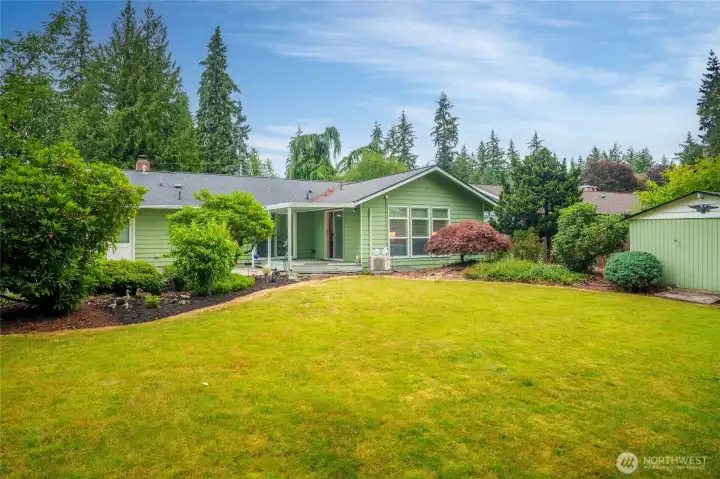 Expansive fenced back yard