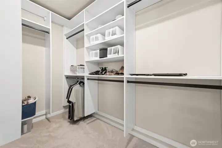 Custom California Closets in the primary bedroom. Custom California Closets in the primary bedroom.