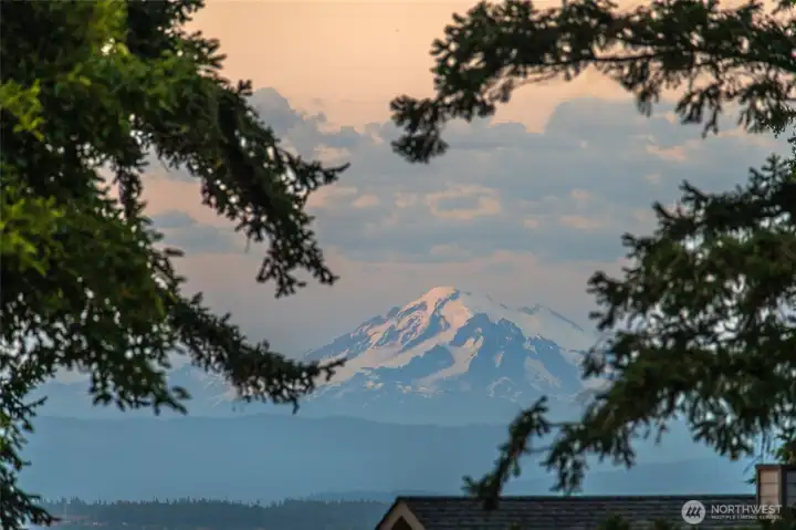 Stunning Mt. Baker view framed by mature evergreens, visible from the front porch. Stunning Mt. Baker view framed by mature evergreens, visible from the front porch.