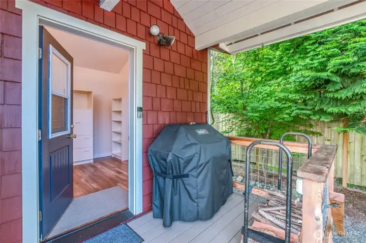 Covered front entry opening into the enclosed mudroom, with space for grilling and firewood storage. Covered front entry opening into the enclosed mudroom, with space for grilling and firewood storage.