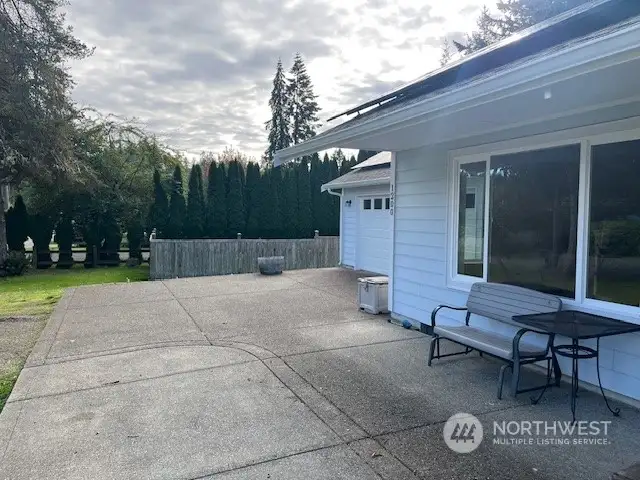 Paved parking pad or patio for entertaining