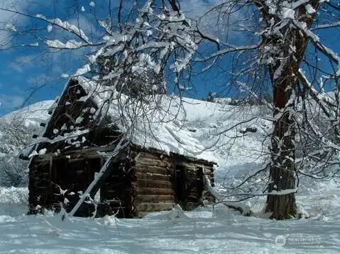 Old homestead on North 40 acres in winter