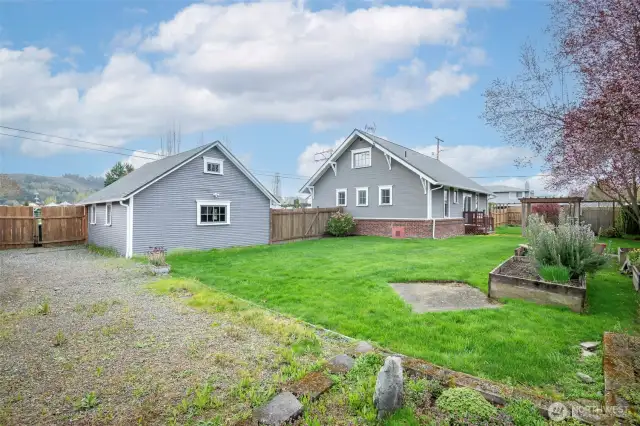 North side of property with double gate for RV or boat parking.
