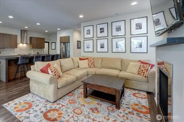 Open and spacious living area with gas fireplace.