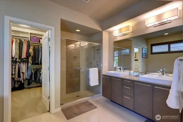 Separate shower and double vanity.
