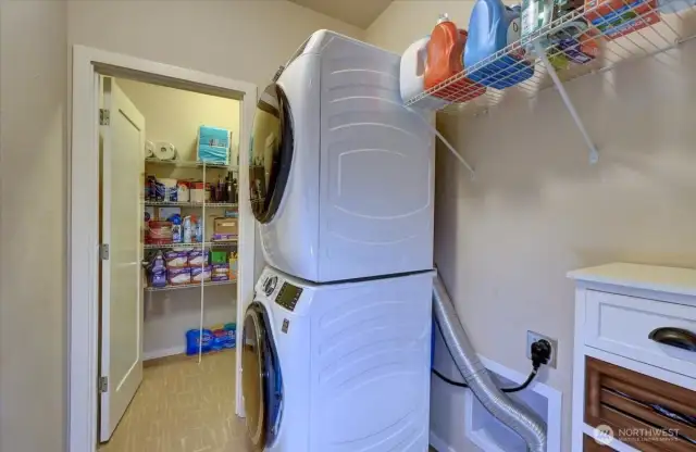 Utility room with adjoining Costco closet - lots of storage in this home.