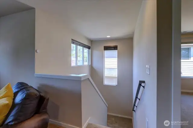 Light filled approach to the second floor.