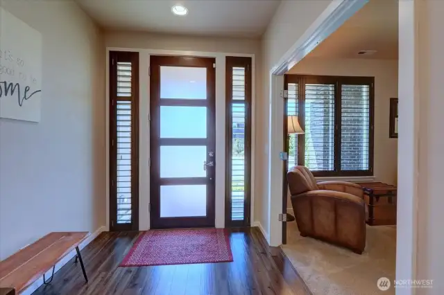 Inviting entry with den/office to the right. Note the $20,000  in window coverings.