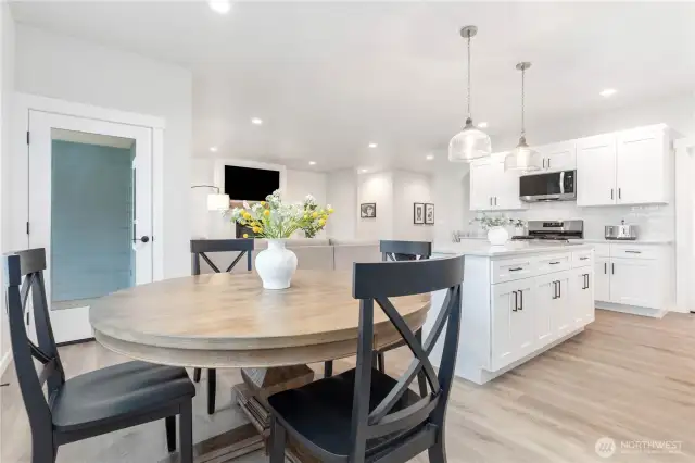The door to the left leads to a covered outdoor patio.