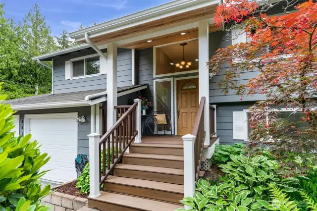 Gorgeous custom Trex deck entry with covered seating area