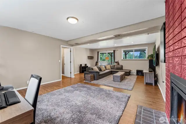 Gigantic downstairs, rec room.