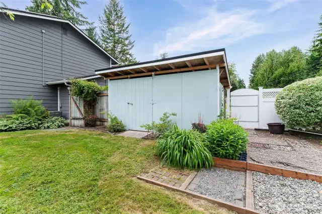 Second storage shed - fit all the lawn tools/toys here!