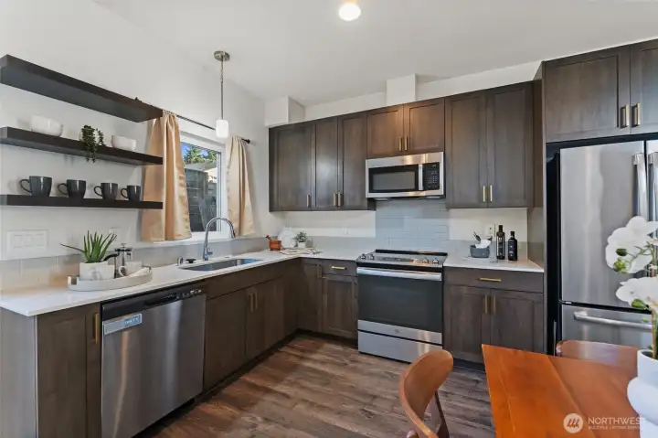 Large kitchen with stainless steel appliances