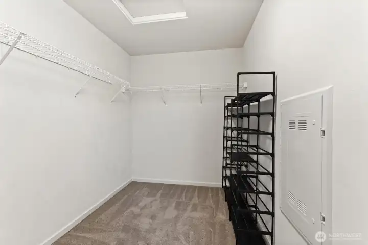 Huge walk-in closet has a sliding barn door (not pictured)