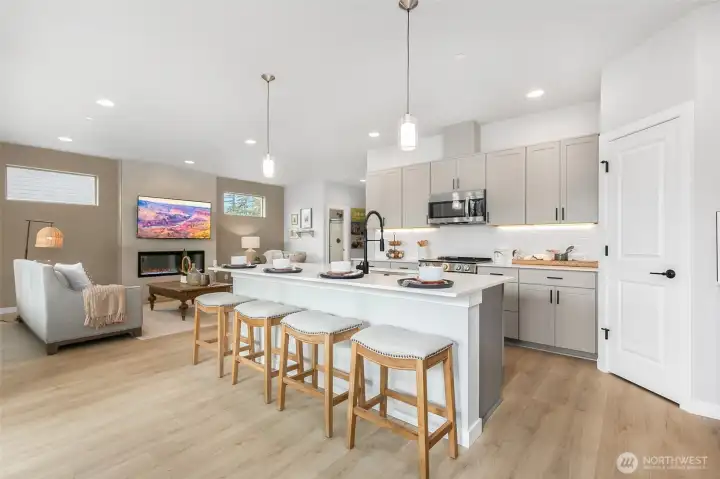 The open concept between the kitchen and the living room makes this home perfect for entertaining.