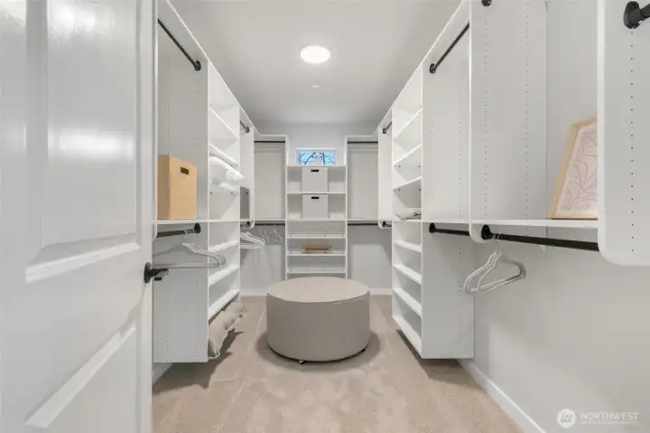 Beautiful built-in Primary Walk in Closet is an absolute dream!
