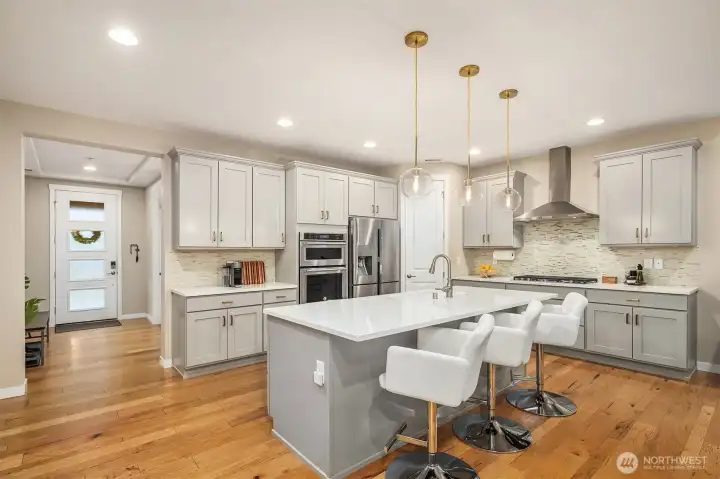 Entrance foyer leads to spacious kitchen and great room